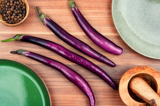 Small uncooked purple eggplants