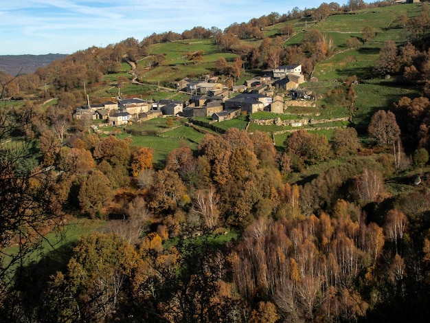 Small village called Casteligo surrounded by forests with autumn colors Ourense Galicia Spain