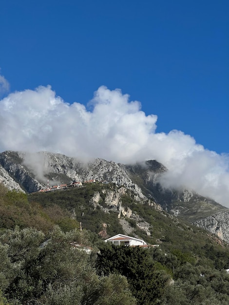 Small village in the mountains covered in mist