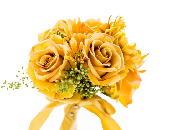 Small wedding bouquet with roses on a white background.