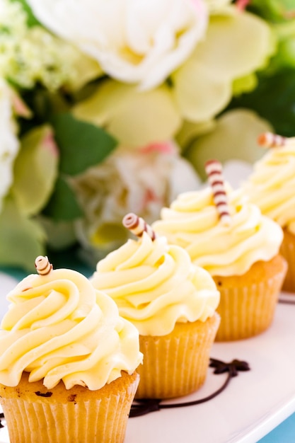 Small white chocolate cupcakes at desesrt bar.