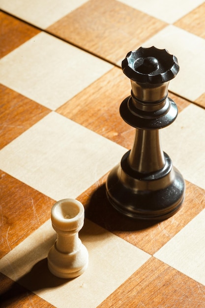 Small wooden chess pieces