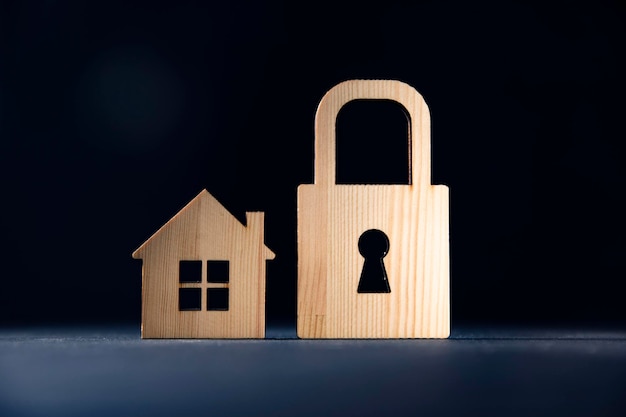 a small wooden lock and a house