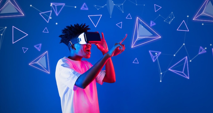 Photo smart boy standing at blue background while floating geometric shape ingenuity