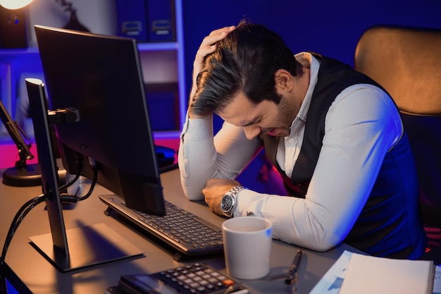 smart businessman having headache with unfinished product service surmise
