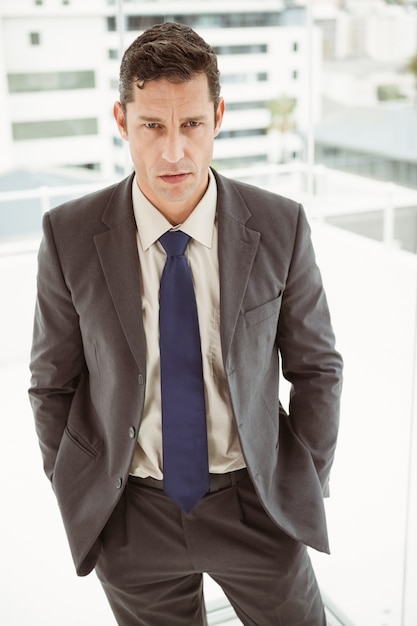 Smart businessman in suit at office