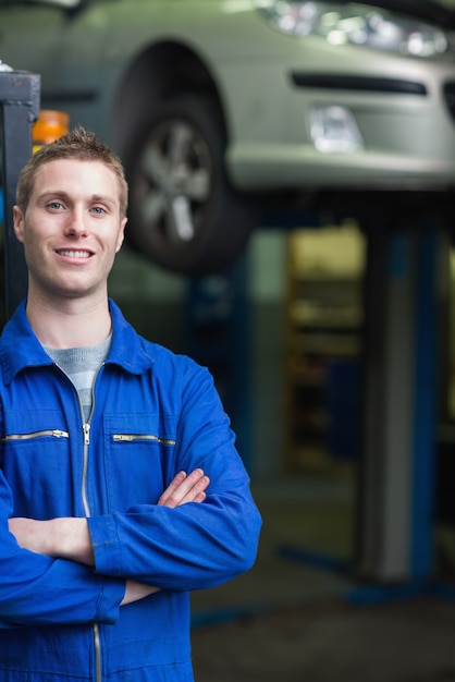 Smart car mechanic smiling