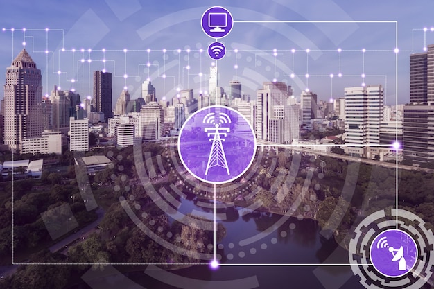 Smart city skyline with wireless communication network icons