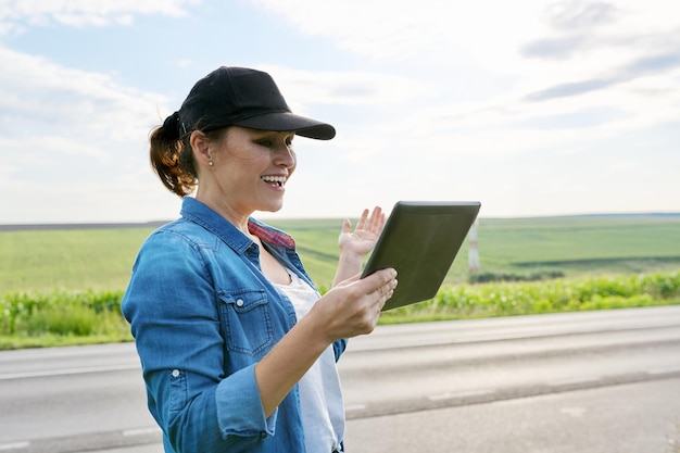 Smart farming and digital agriculture female agricultural
worker with digital tablet