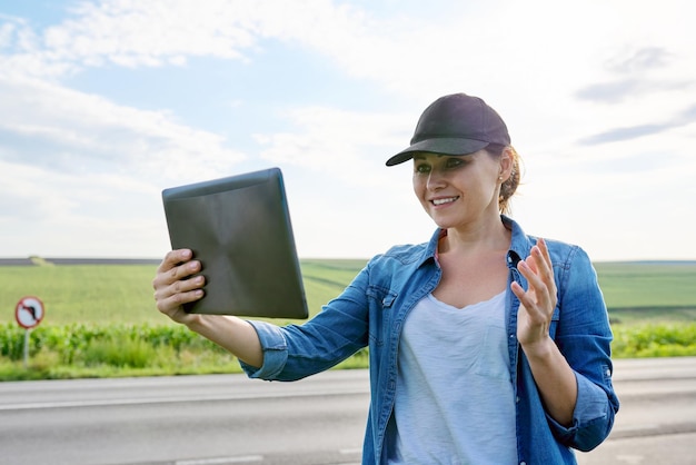 Smart farming and digital agriculture female agricultural
worker with digital tablet