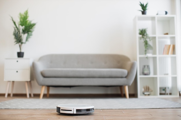 Smart home device conducting daily vacuuming in living room