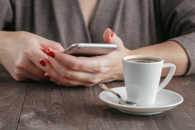 Smart Phone in woman hands