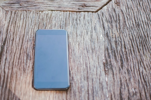 smart phone on wooden table