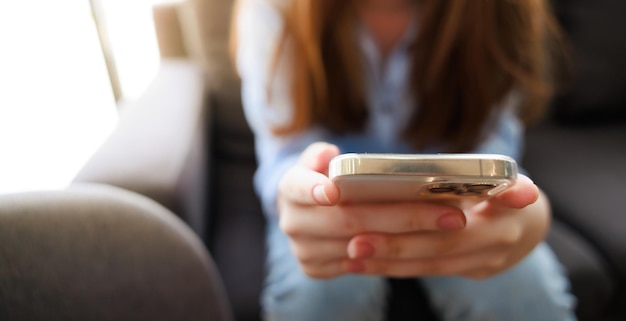 Smart phone Young caucasian female student use martphone