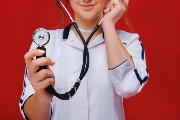 Smart success physician working with a stethoscope