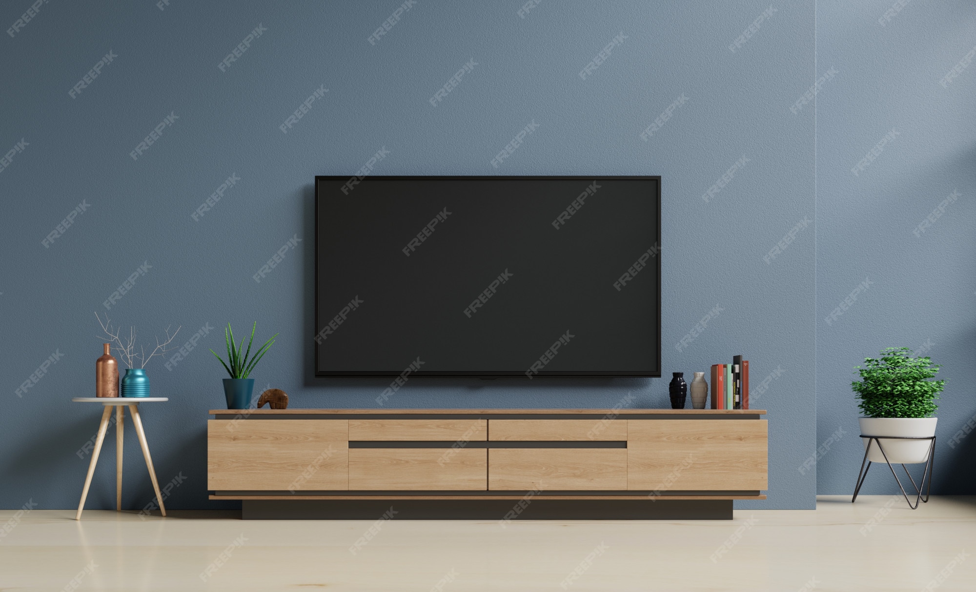 Premium Photo Smart TV on the dark blue wall in living room,minimal design.
