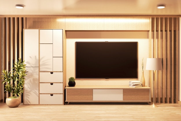 Foto smart tv a parete e mobile in legno in stile giapponese in camera minimalista. 3d rednering