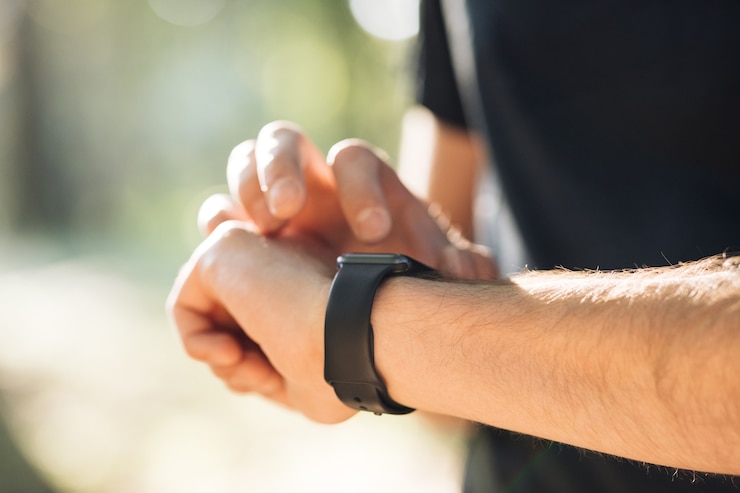 Photo smart watch on a man's hand outdoor