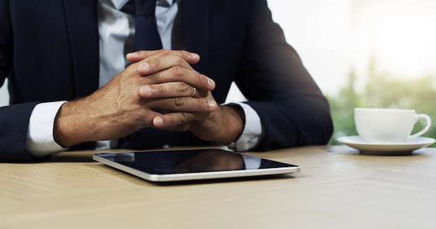 The smartest office is one thats mobile Closeup shot of an unidentifiable businessman using a digital tablet in an office