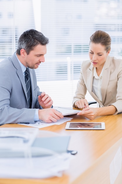 Smartly dressed colleagues in business meeting