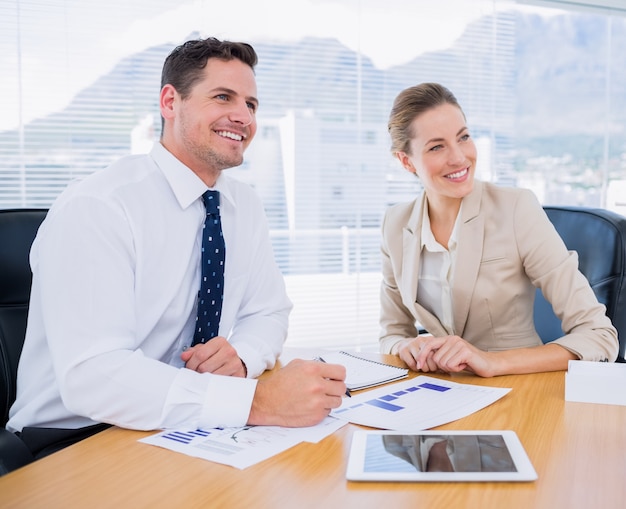 Smartly dressed colleagues in business meeting