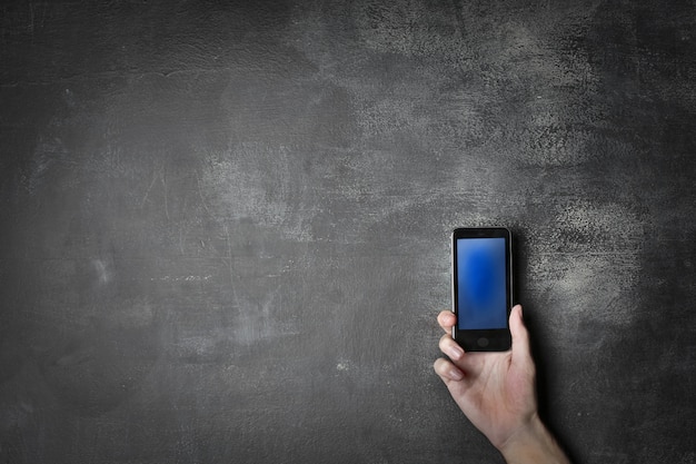 Smartphone and blackboard