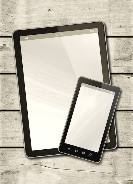 Smartphone and digital tablet PC on a white wood table