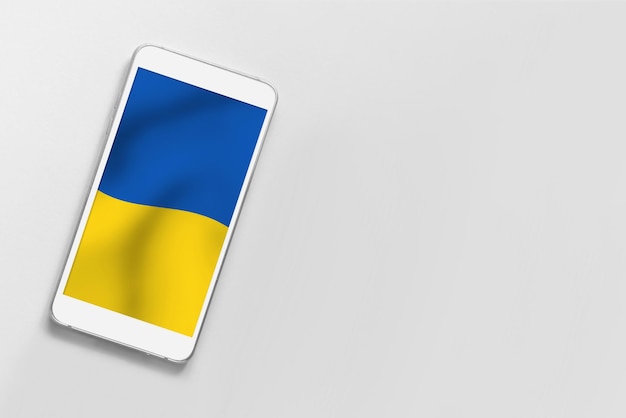 Smartphone-display met Oekraïense vlag geïsoleerd over grijze achtergrond Kopieer ruimte Oekraïense symbolen Wallpaper