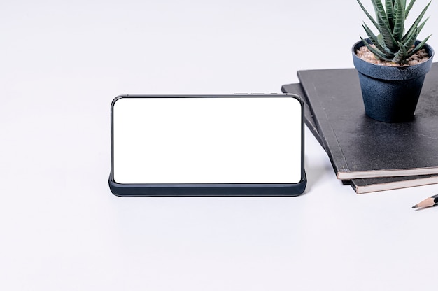 Smartphone en keramische vaas