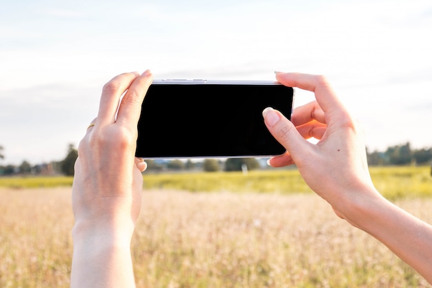 smartphone in hand holding