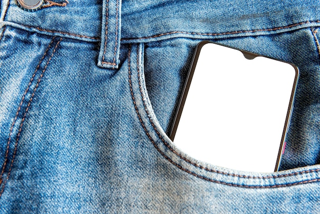 Smartphone in jeans pocket, writing space.