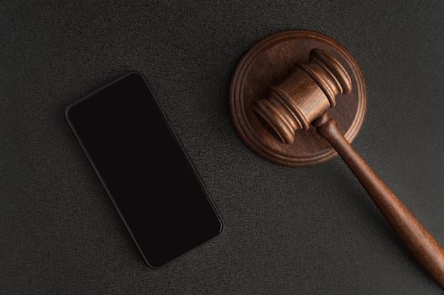 Smartphone and mallet of judge