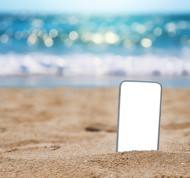 写真 スマートフォンでビーチでリラックスする旅行予約コンセプト
