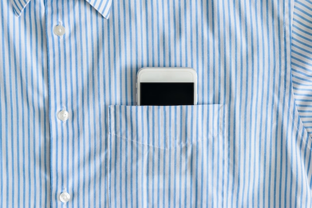 Smartphone in a pocket of shirt