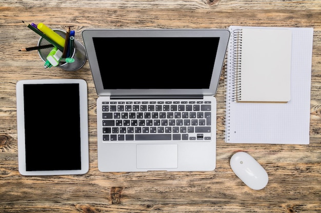 Smartphone with blank screen and table pc on  background