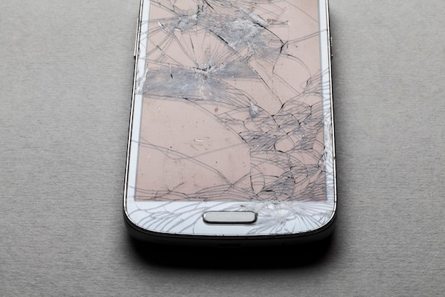 Smashed shattered broken screen of a mobile smartphone