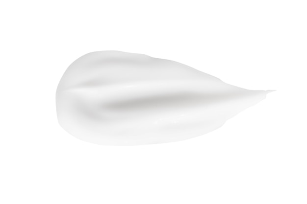 A smear of white cosmetic cream without shadows on a white background Isolated