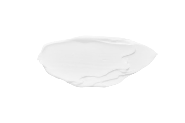 A smear of white cosmetic cream without shadows on a white background Isolated