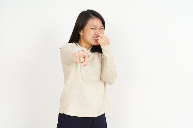 Smelling something stinky and disgusting of Beautiful Asian Woman Isolated On White Background