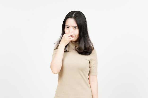 Smelling something stinky and disgusting Of Beautiful Asian Woman Isolated On White Background