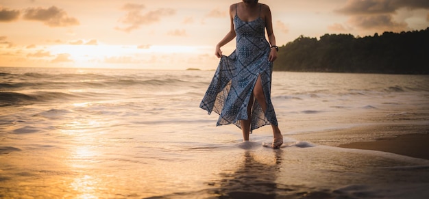 Smile Freedom and happiness asian woman on beach She is enjoying serene ocean nature during travel holidays vacation outdoors asian beauty summer time