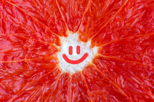 Smile on Grapefruit  background. Citrus close up photo. Healthy lifestyle photo. Beautiful wallpaper. Vegetarian and vegan concept. Vitamins from nature. Positive thinking. All be alright.