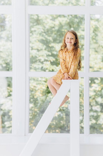 Smile little girl in studio