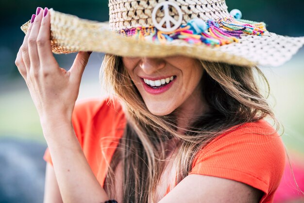 Smile and perfect teeth beautiful young woman laughing and enjoying outdoor