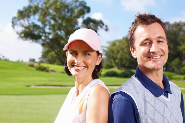 smile portrait and couple on golf course with teamwork outdoor fun and fitness on weekend morning confidence happy woman and man on green for sports date health and wellness with partnership