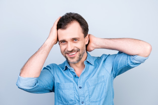 Smiley casual man posing