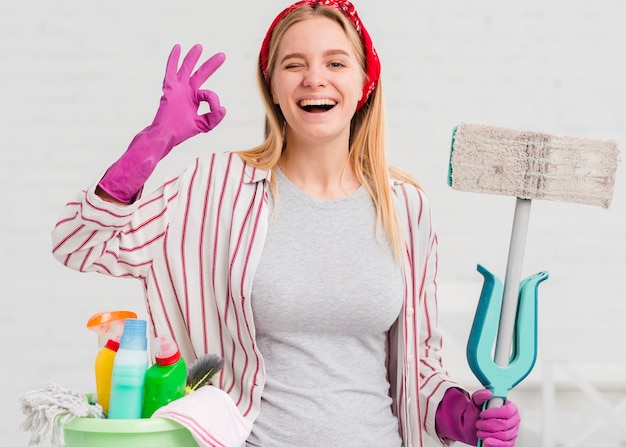 Smiley woman showing ok sign