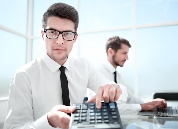 Smiling accountants discussing reports at the office