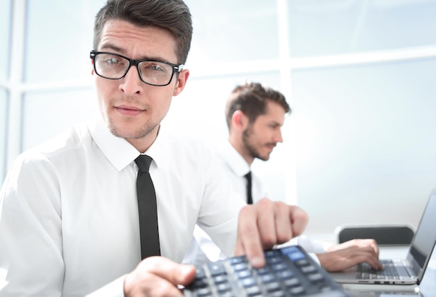 Smiling accountants discussing reports at the office