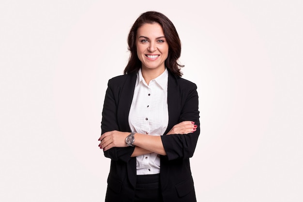 Smiling adult businesswoman in formal outfit